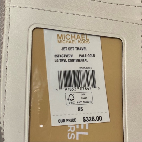Michael Kors Jet Set
Travel Large Signature
Logo and Metallic Continental Wallet - Picture 13 of 13